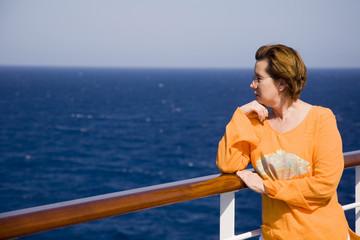 Fototapeta premium Woman at the rail of a cruise ship