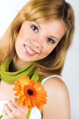 Beauty portrait of a young woman with a flower - 13329821