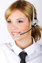young successful business woman is calling with a headset - 13329880