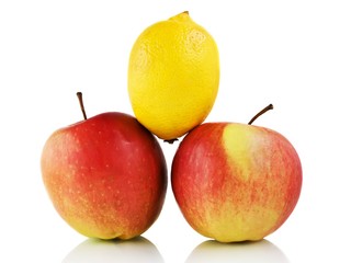 Lemon and apples isolated on white background