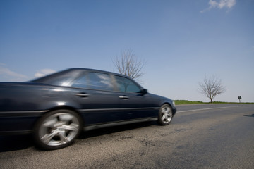 Fototapeta na wymiar fast moving car