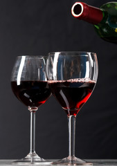 .Red wine poured in a glass