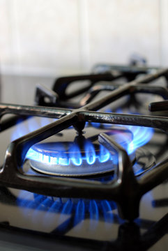 Burning gas oven in kitchen