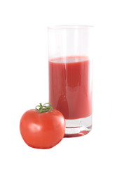 Glass with juice and a tomato