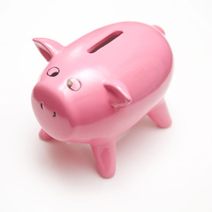 Piggy bank style money box isolated on a white background.