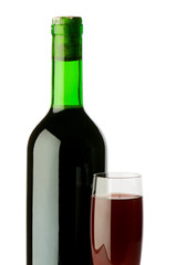 Bottle and wine glass on reflective background