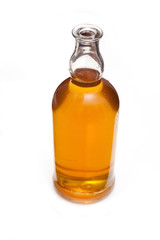 Bottle of Scotch whiskey isolated on a white studio background.