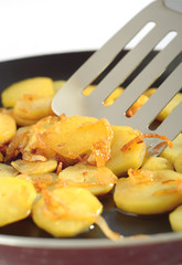 Fried potatoes' slices