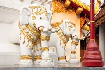 Elephants and pagoda in traditional Thai style molding art