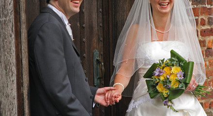 wedding couple hold hands - 13374830