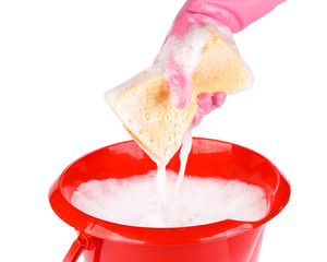 Household sponge in a hand
