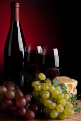 Obraz na płótnie Canvas Red wine and grapes