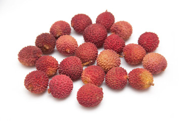 Lychees isolated on a white studio background.