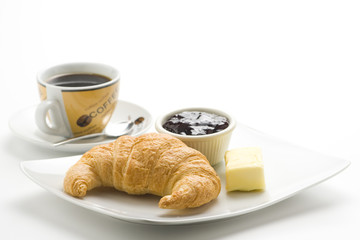delicious continental breakfast of coffee and croissants