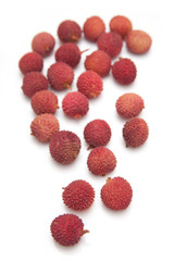 Lychees isolated on a white studio background.