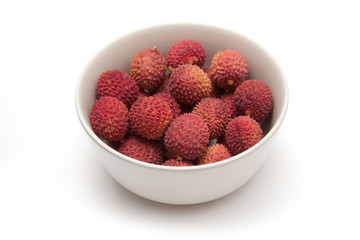 Lychees isolated on a white studio background.