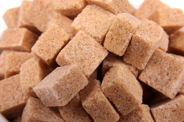 close-ups of brown sugar cubes, background