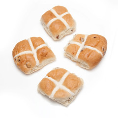 Hot cross buns isolated on a white studio background.