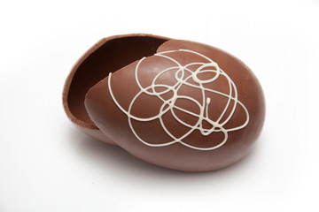 Chocolate easter egg isolated on a white studio background.