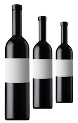 Drei Rotweinflaschen