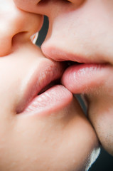 Close-up of kissing lips