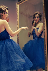 Beautiful woman and the mirror