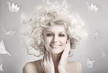 Wandaufkleber Smiling blond beautiful woman © konradbak