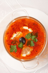 tasty red soup with lemon