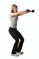 Sportswoman with dumbbells