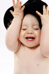 Baby in black hat