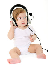 Beautiful baby with black headphones