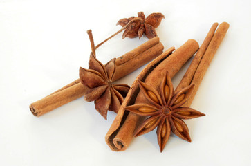 cinnamon bark  and anise stars on white background