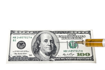 US dollar and syringe