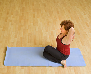 senior woman exercising yoga