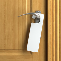 white card with copy space on doorknob