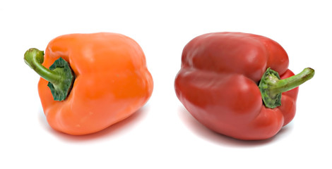 Red and yellow bell peppers  isolated on white background