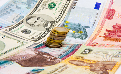 Coins on a bank notes layer