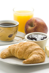 delicious continental breakfast of coffee and croissants