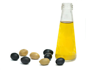 Bottle of olive oil and marinated olve fruits isolated on white