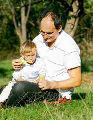 father and son in the park