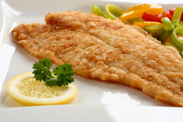 Fried fish fillet with vegetables