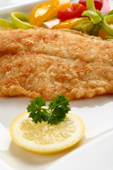 Fried fish fillet with vegetables