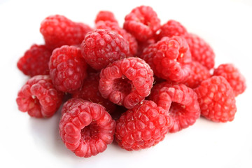 Raspberries on a White Dish