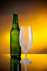 bottle of beer and frosty glass