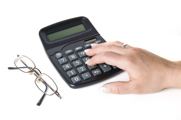 Woman's Hand on Calculator