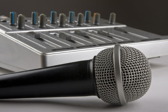 microphone with the mixer in sound studio