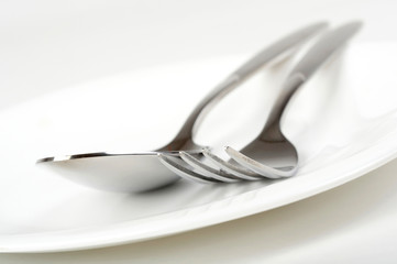 Photo of fork and spoon on plate