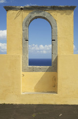 window castle overlooking the sea