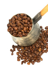 Obraz premium Copper coffee pot with wooden handle isolated on white