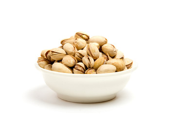 Pistachios with shell on white background